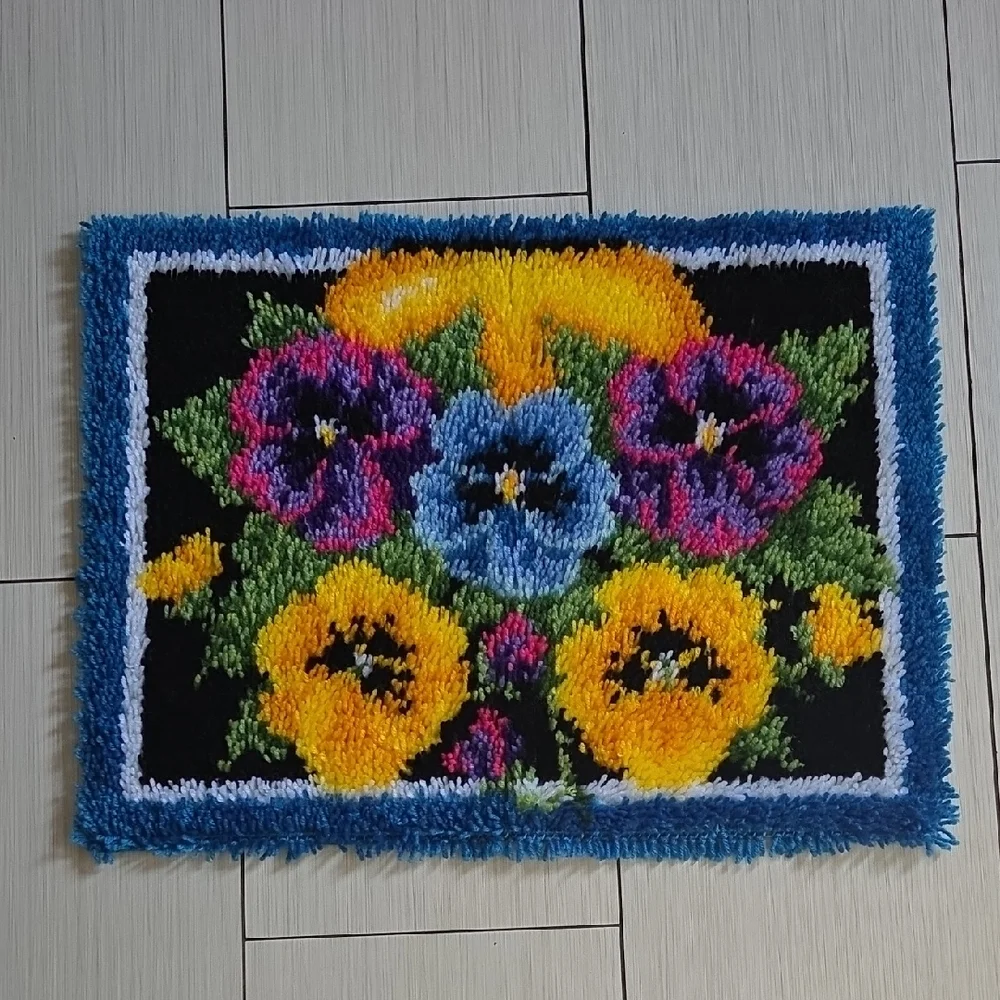 Completed Caron Wonderart Pot of Pansies Rug